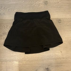 This is a lululemon pace rival skirt in the regular length and mid rise